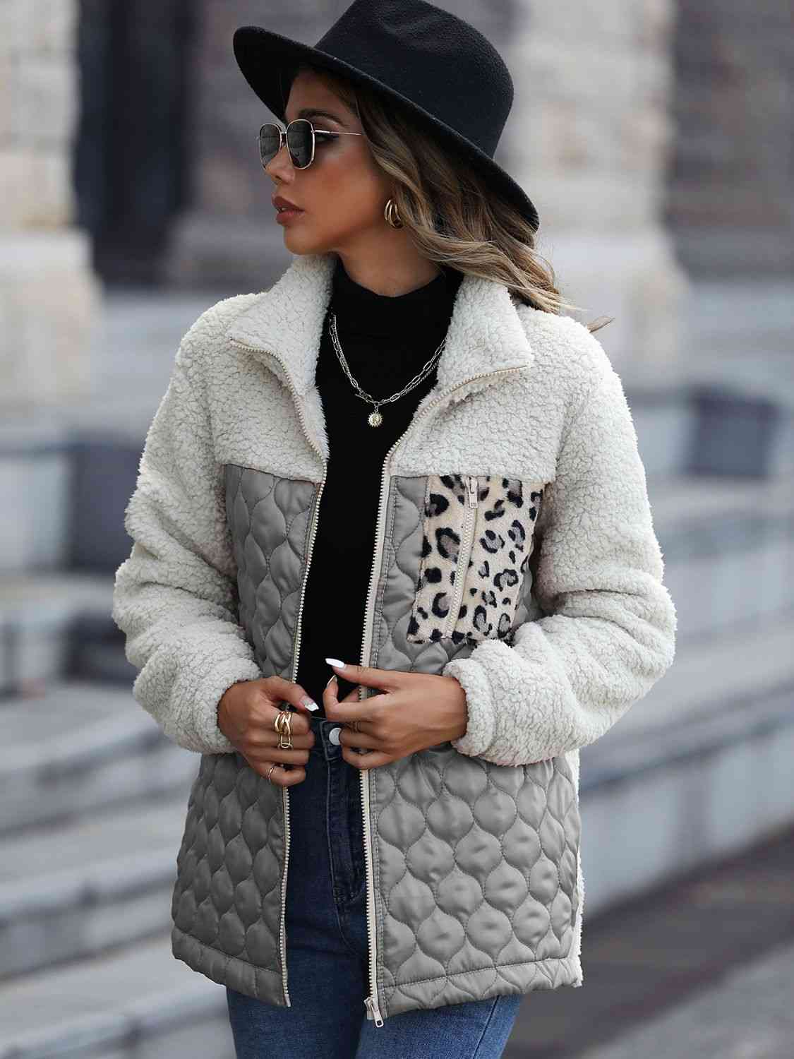 A zip-up jacket with convenient pockets, combining style and practicality for everyday wear.