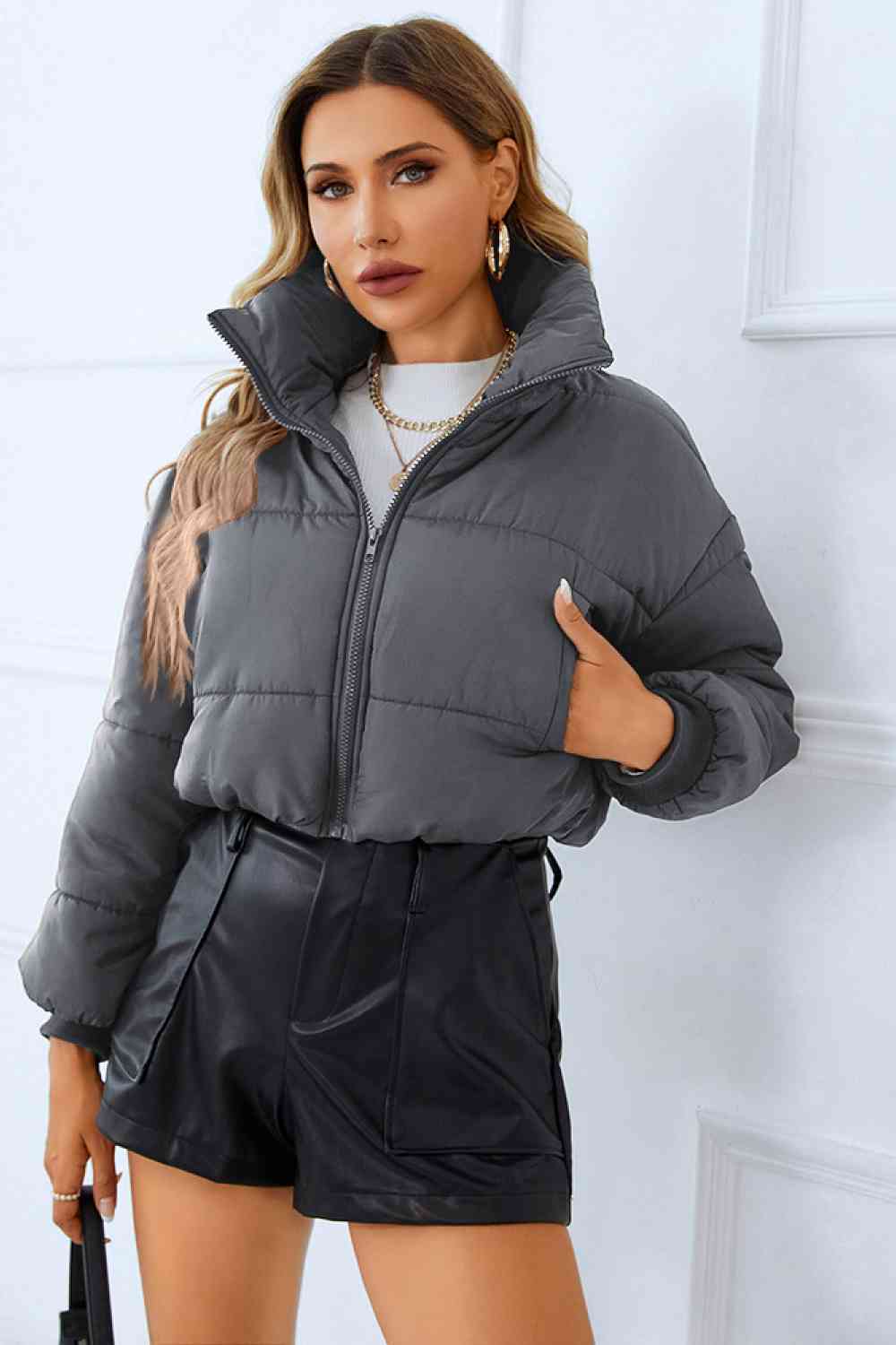 A winter coat designed for warmth and functionality, featuring multiple spacious pockets for added convenience.