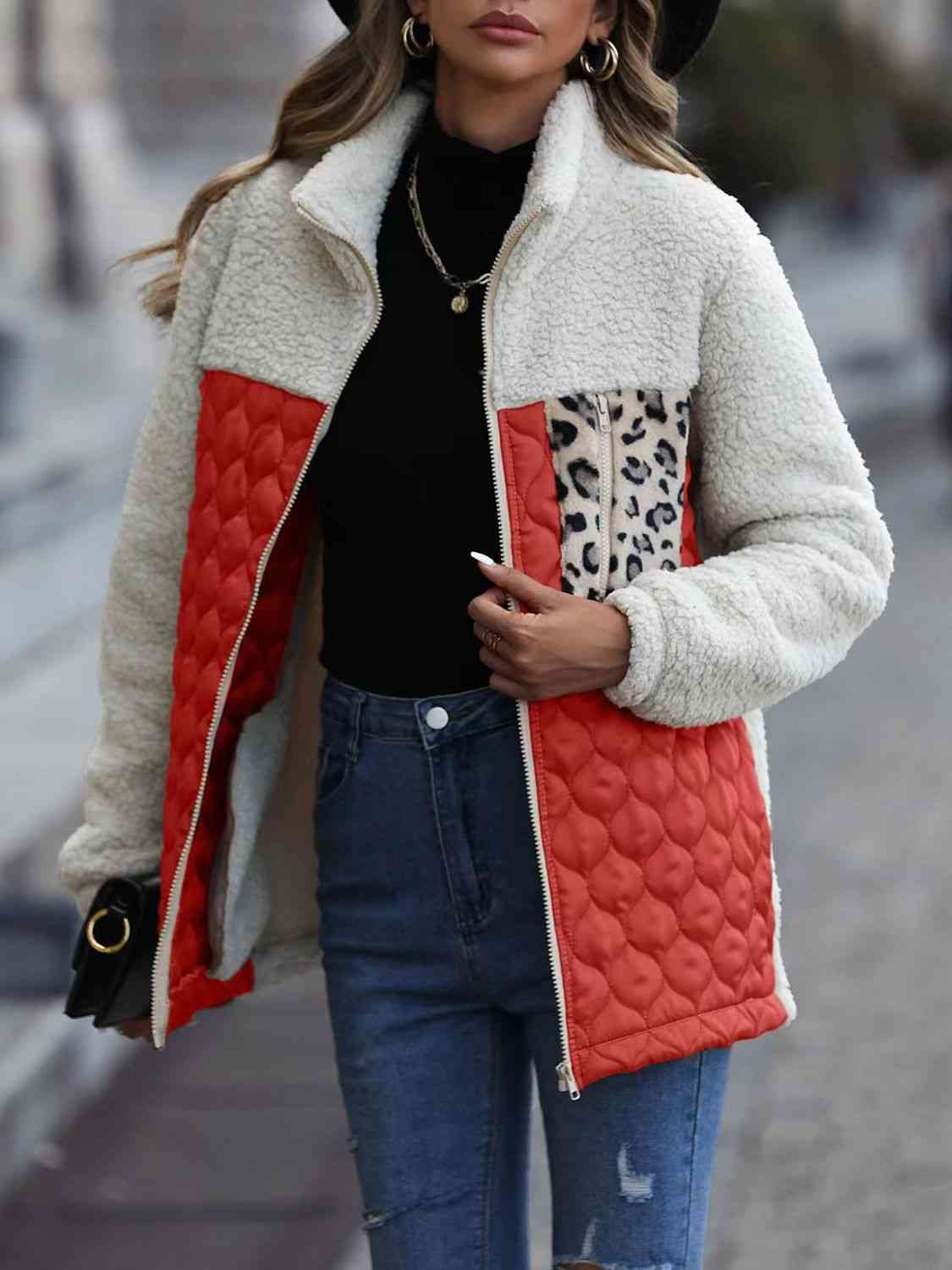 A zip-up jacket with convenient pockets, combining style and practicality for everyday wear.