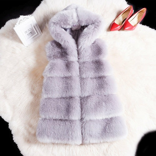 Elevate your winter wardrobe with the exquisite Giorgia Faux Fur Jacket. Embrace both fashion and comfort with this stylish jacket, perfect for staying cozy.