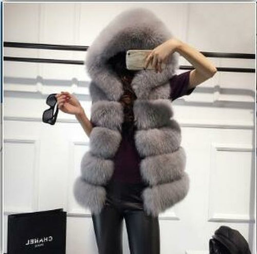 Elevate your winter wardrobe with the exquisite Giorgia Faux Fur Jacket. Embrace both fashion and comfort with this stylish jacket, perfect for staying cozy.