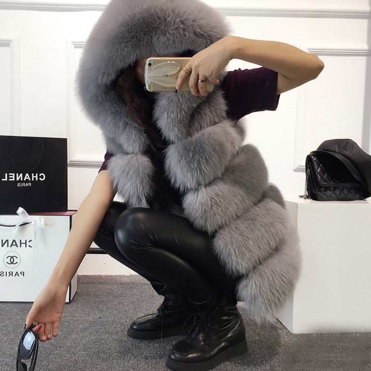 Elevate your winter wardrobe with the exquisite Giorgia Faux Fur Jacket. Embrace both fashion and comfort with this stylish jacket, perfect for staying cozy.