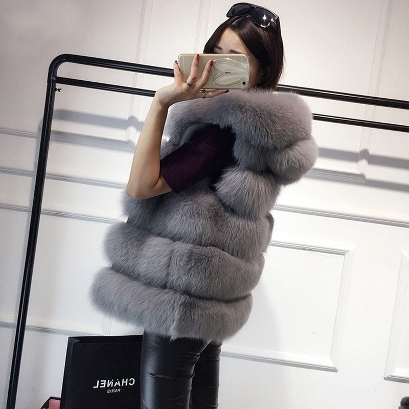 Elevate your winter wardrobe with the exquisite Giorgia Faux Fur Jacket. Embrace both fashion and comfort with this stylish jacket, perfect for staying cozy.