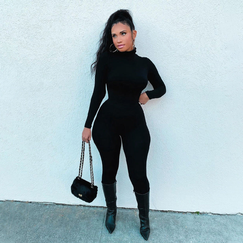 A jumpsuit made from compression fabric, designed for a snug and supportive fit, often worn for athletic or active purposes.