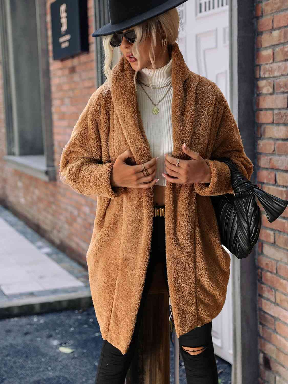 A hooded coat, providing added protection and style with its attached hood for shielding against the elements.
