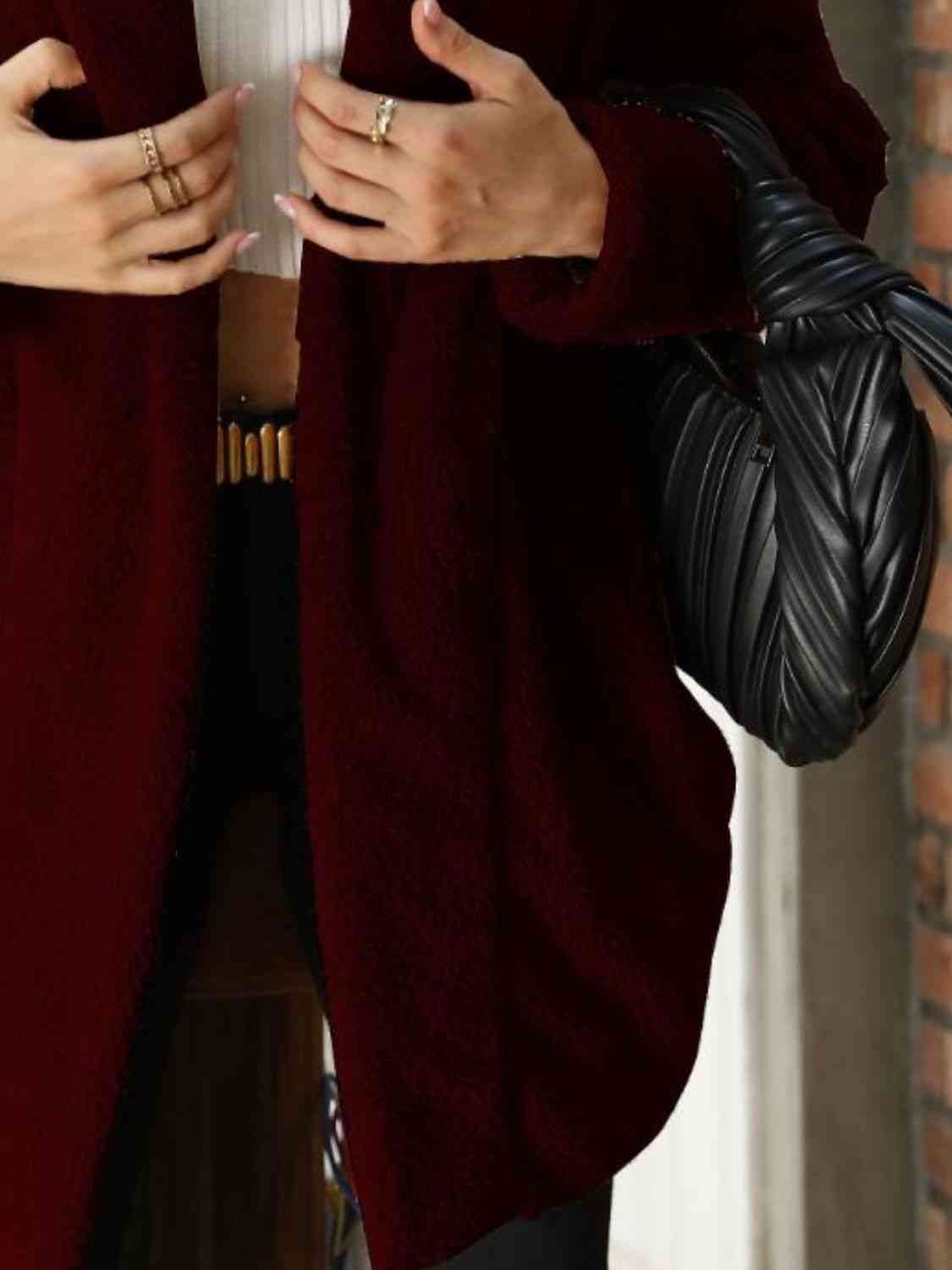 A hooded coat, providing added protection and style with its attached hood for shielding against the elements.
