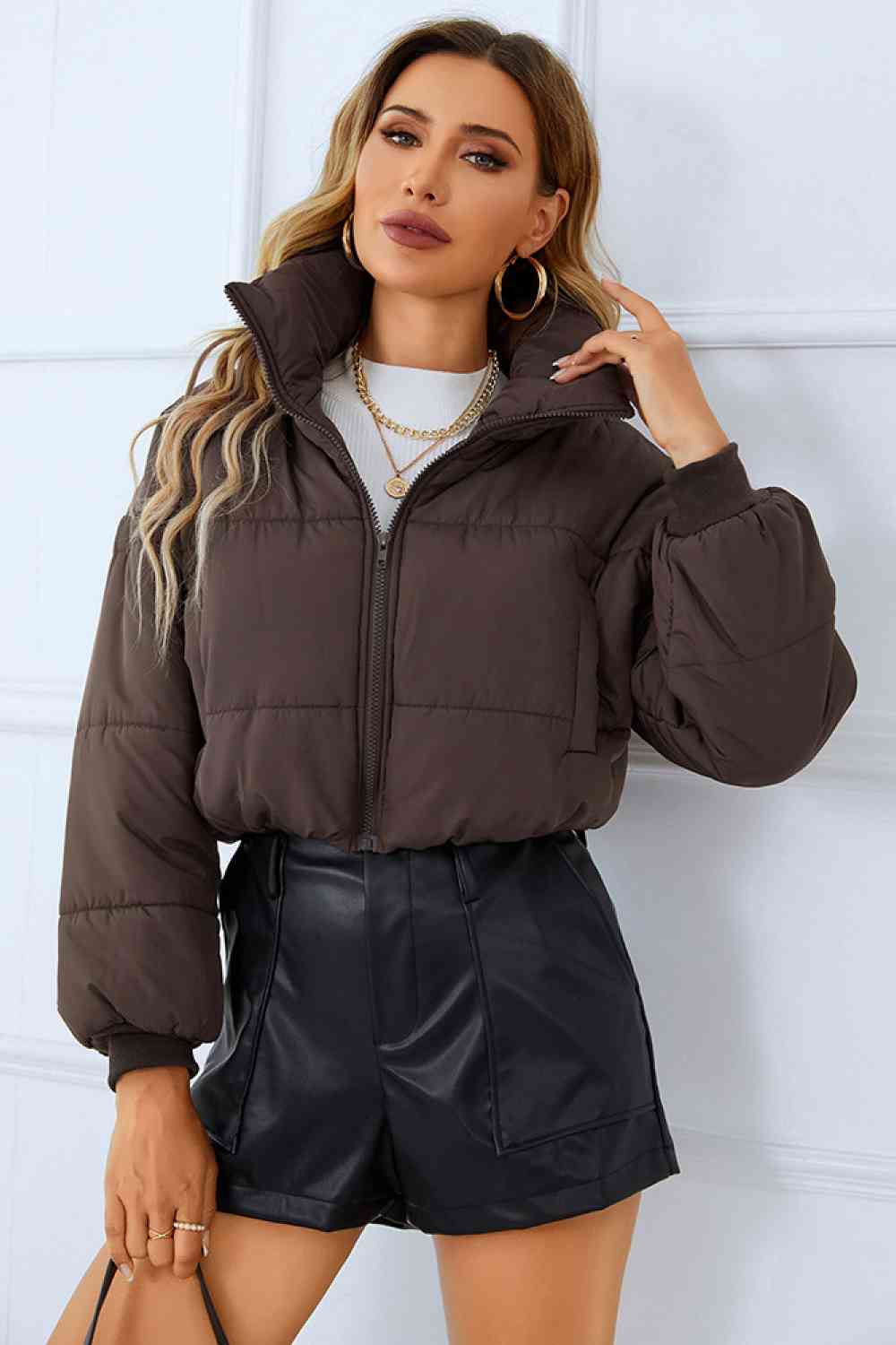 A winter coat designed for warmth and functionality, featuring multiple spacious pockets for added convenience.