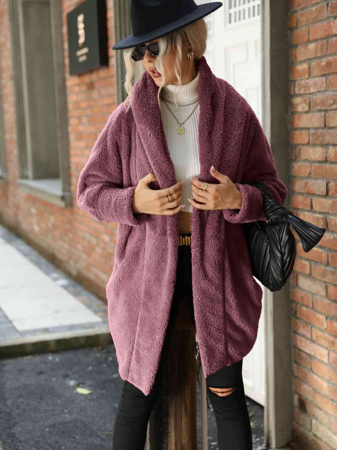 A hooded coat, providing added protection and style with its attached hood for shielding against the elements.