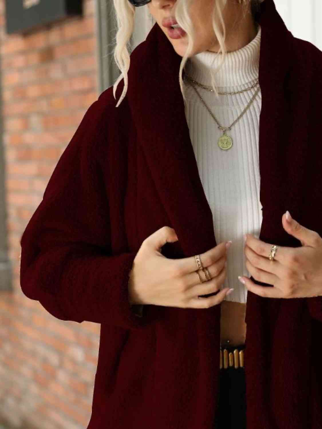 A hooded coat, providing added protection and style with its attached hood for shielding against the elements.