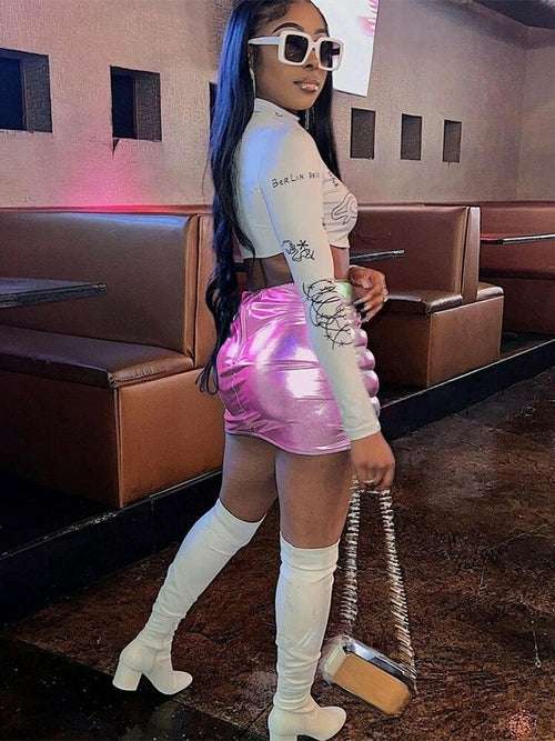 Zipper Miniskirt' emphasizing its sleek design with a prominent zipper detail, offering a modern twist to a classic silhouette.
