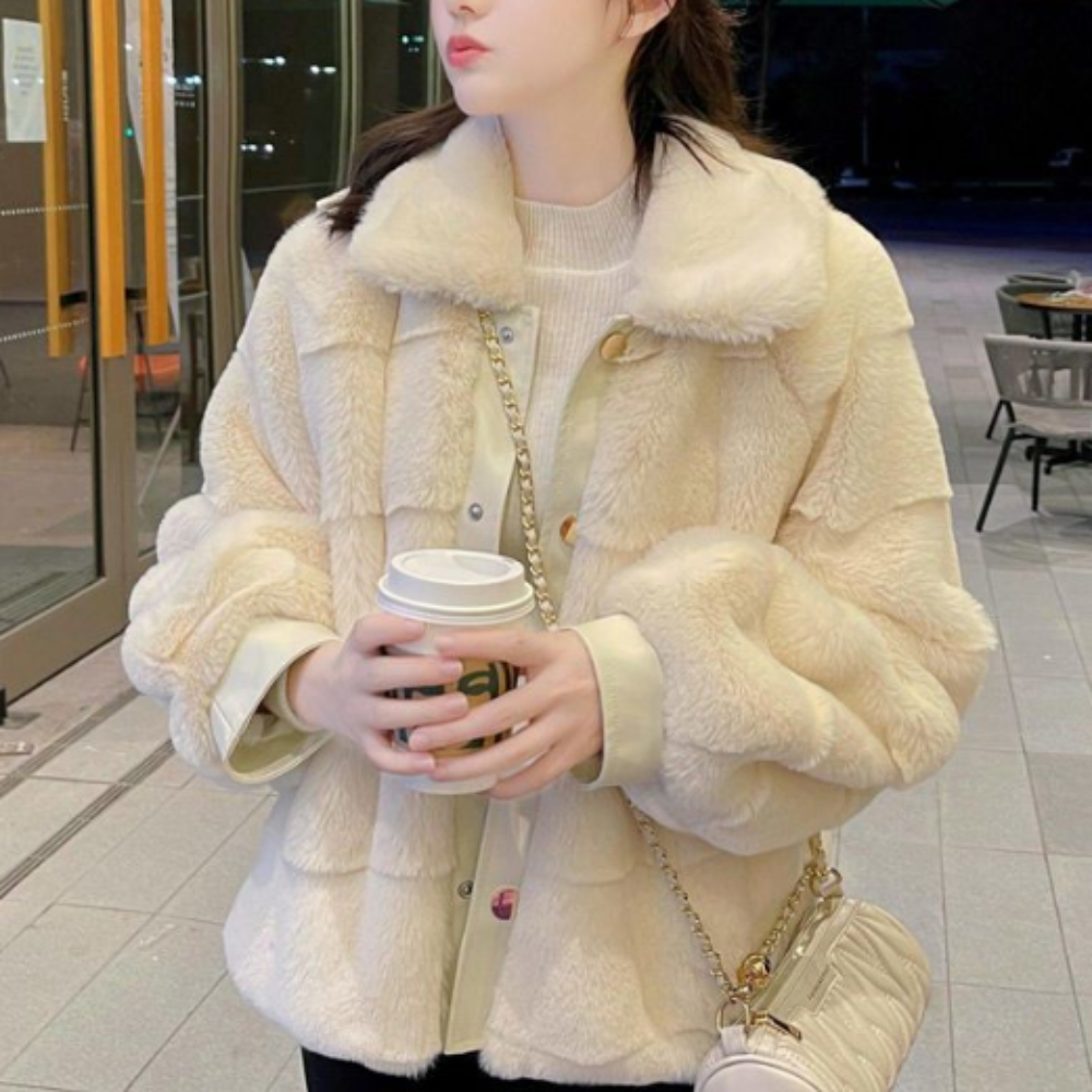 Stay stylish and cozy with our faux fur jacket, the perfect addition to your winter wardrobe.