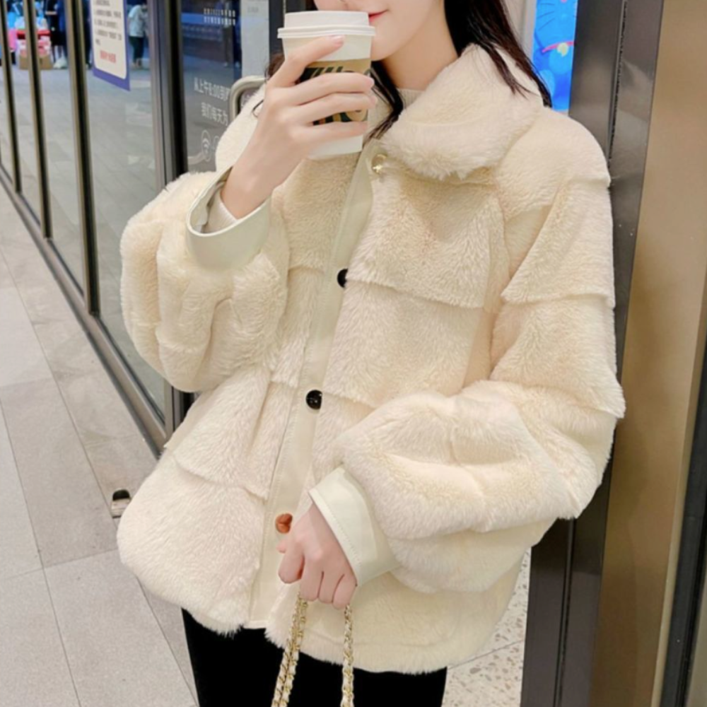 Stay stylish and cozy with our faux fur jacket, the perfect addition to your winter wardrobe.