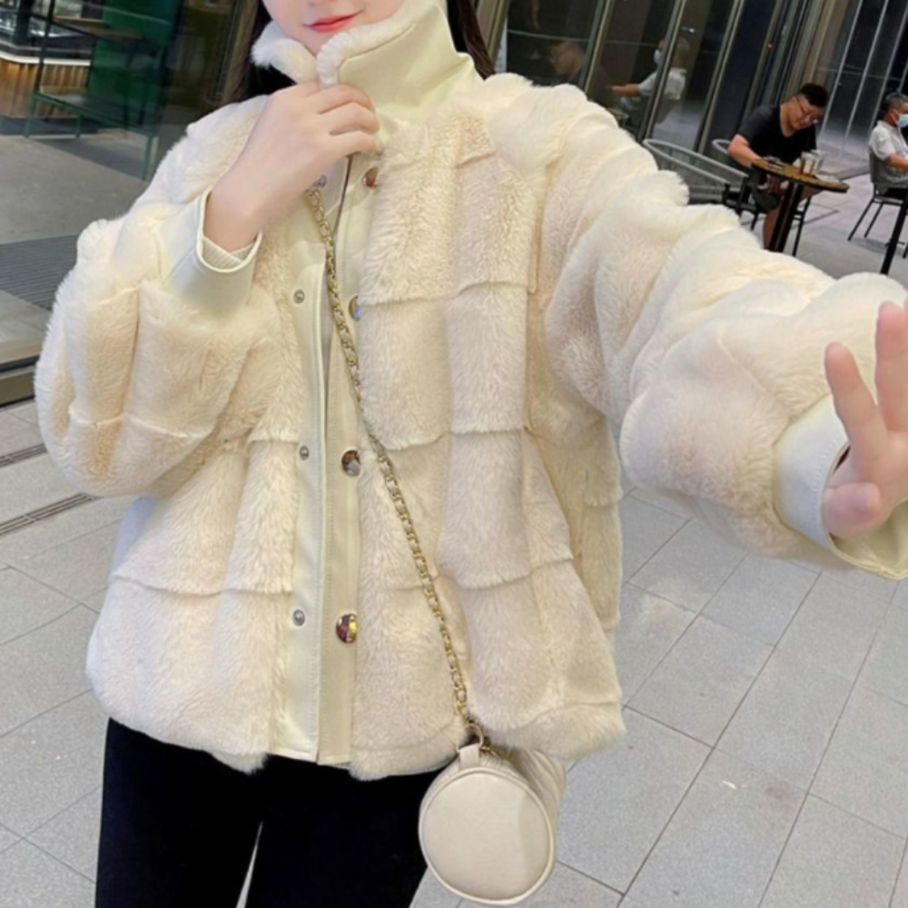 Stay stylish and cozy with our faux fur jacket, the perfect addition to your winter wardrobe.