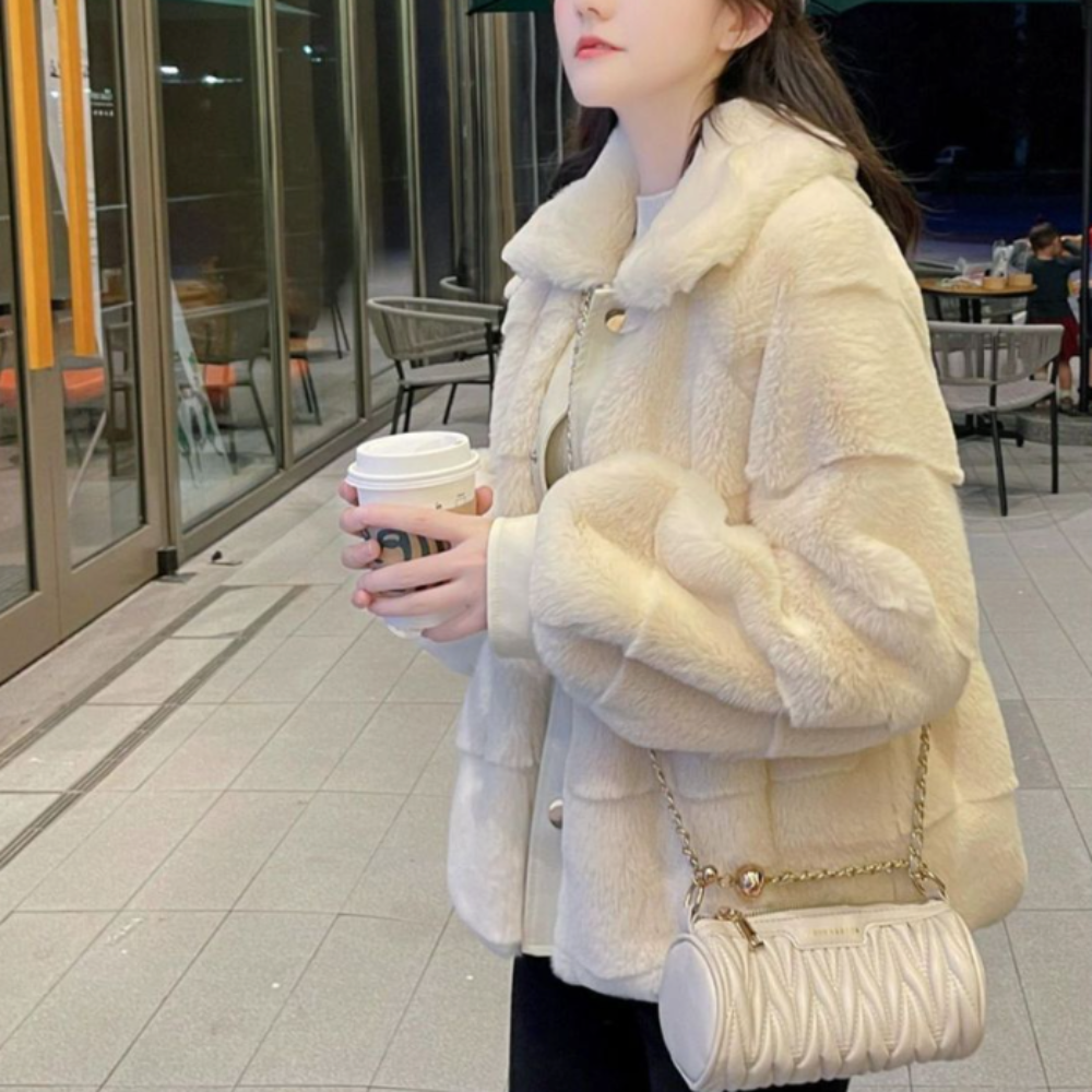 Stay stylish and cozy with our faux fur jacket, the perfect addition to your winter wardrobe.