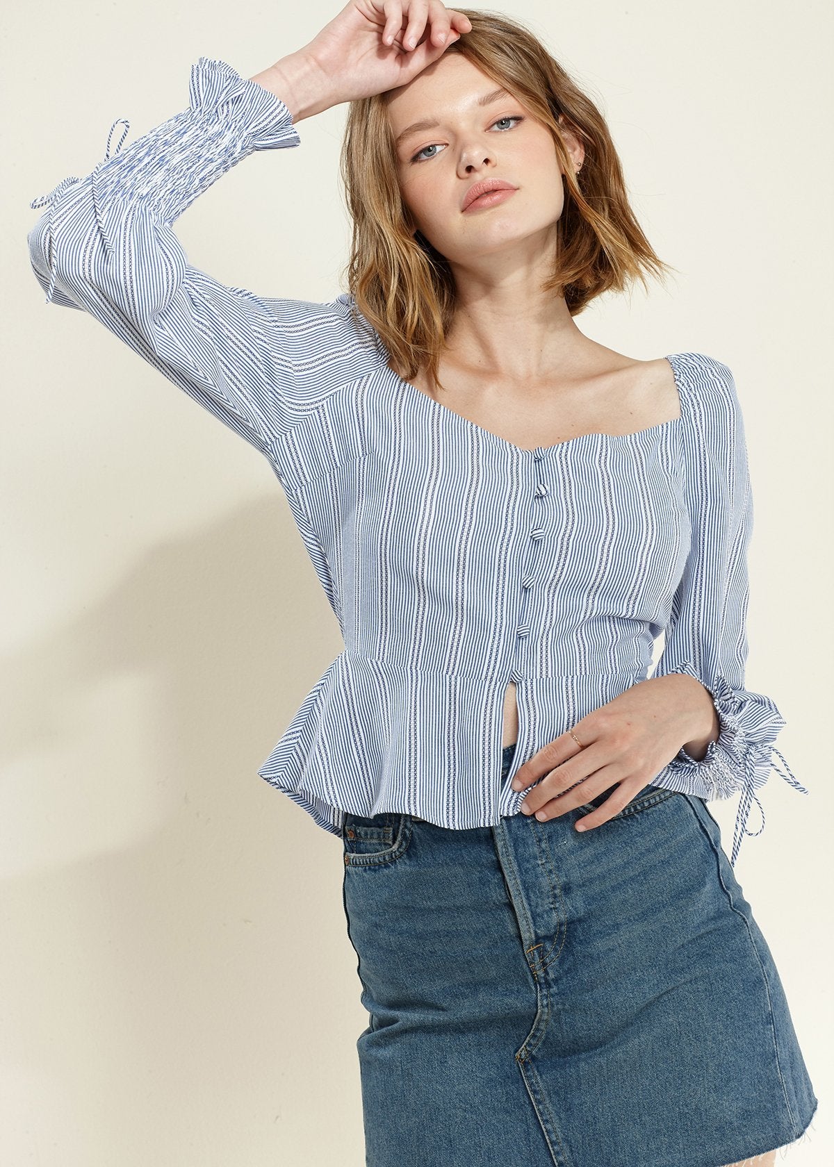Blue Off-Shoulder Blouse' featuring a blouse in a vibrant blue color with an off-shoulder neckline, creating a chic and stylish look.