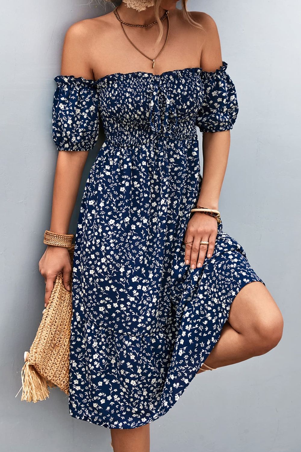 Smocked Off-Shoulder Dress: A stylish dress featuring a smocked bodice and an off-shoulder neckline for a trendy and feminine look.