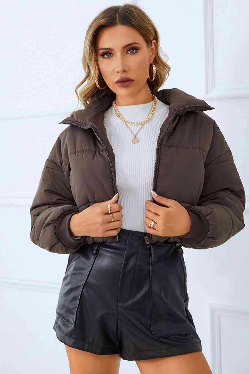 A winter coat designed for warmth and functionality, featuring multiple spacious pockets for added convenience.