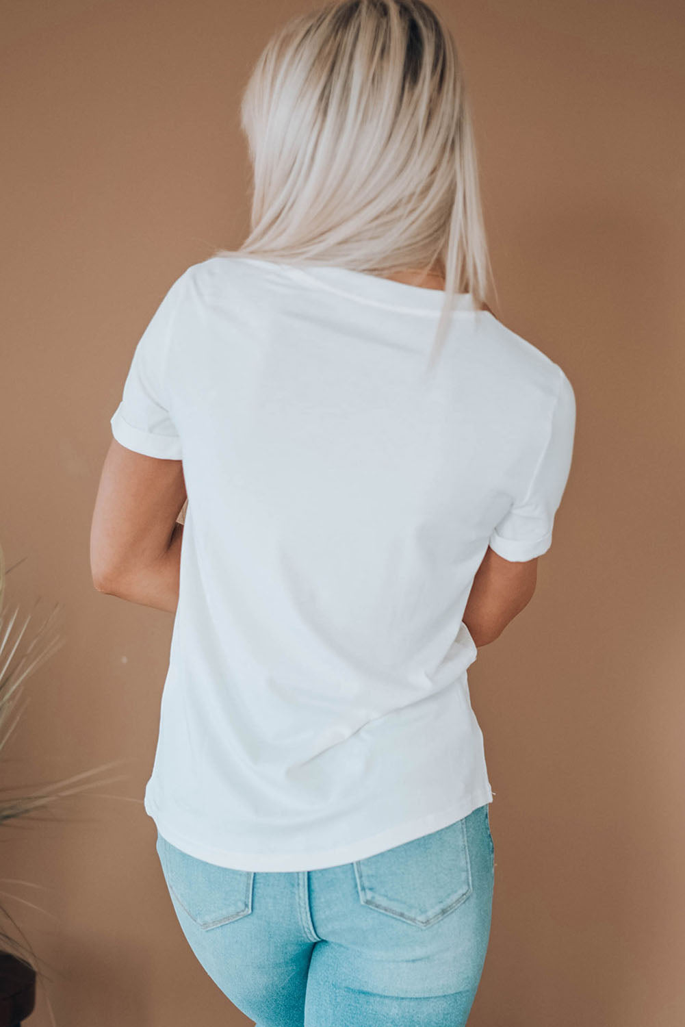 Cuffed Tee' showcasing its distinct rolled-up sleeve detail, offering a casual yet polished look for everyday wear.