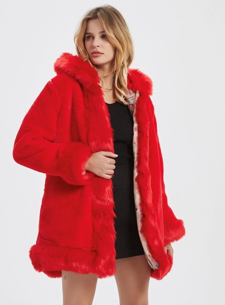 Stay glamorous and warm with our faux fur coat, a stylish choice for colder days.