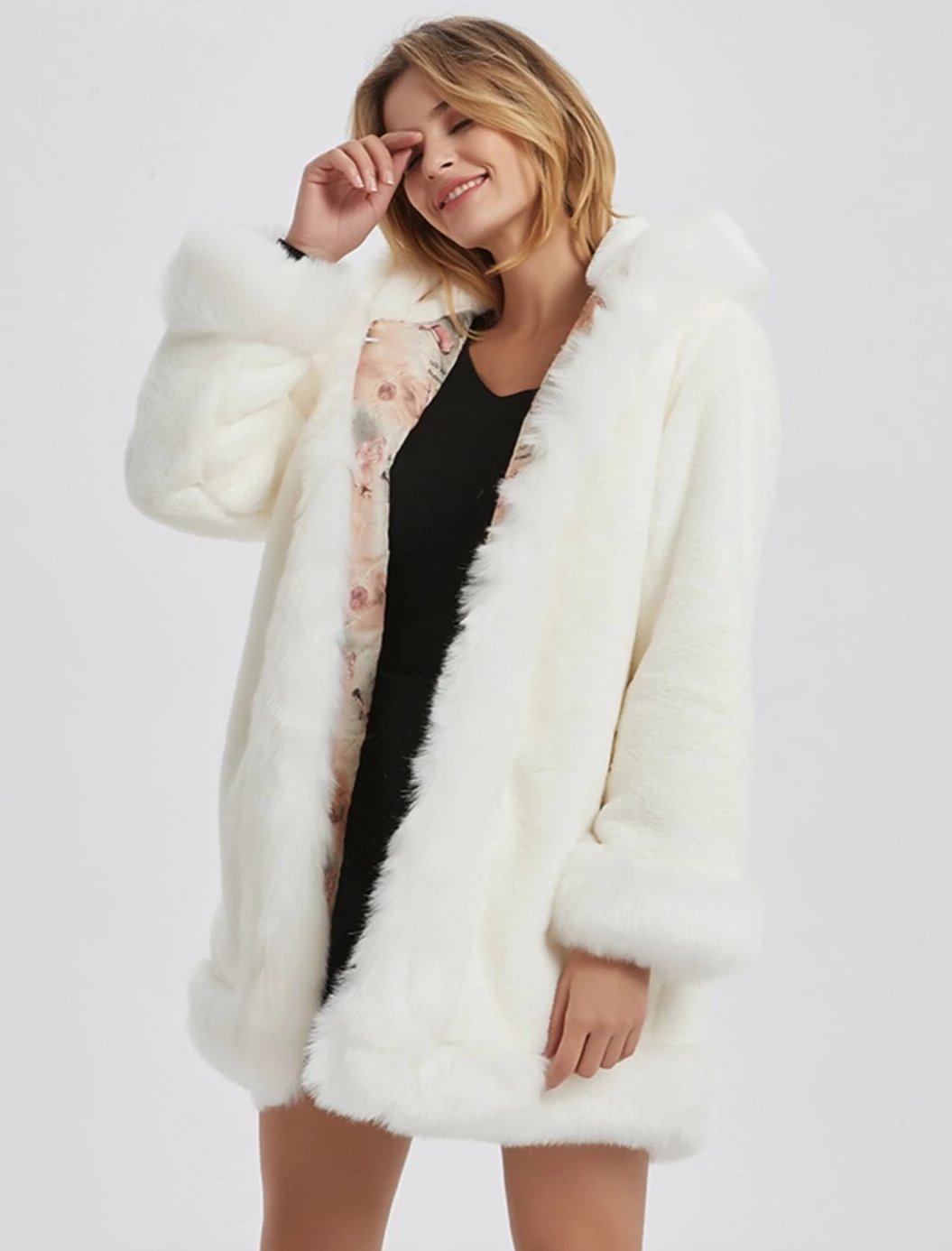 Stay glamorous and warm with our faux fur coat, a stylish choice for colder days.