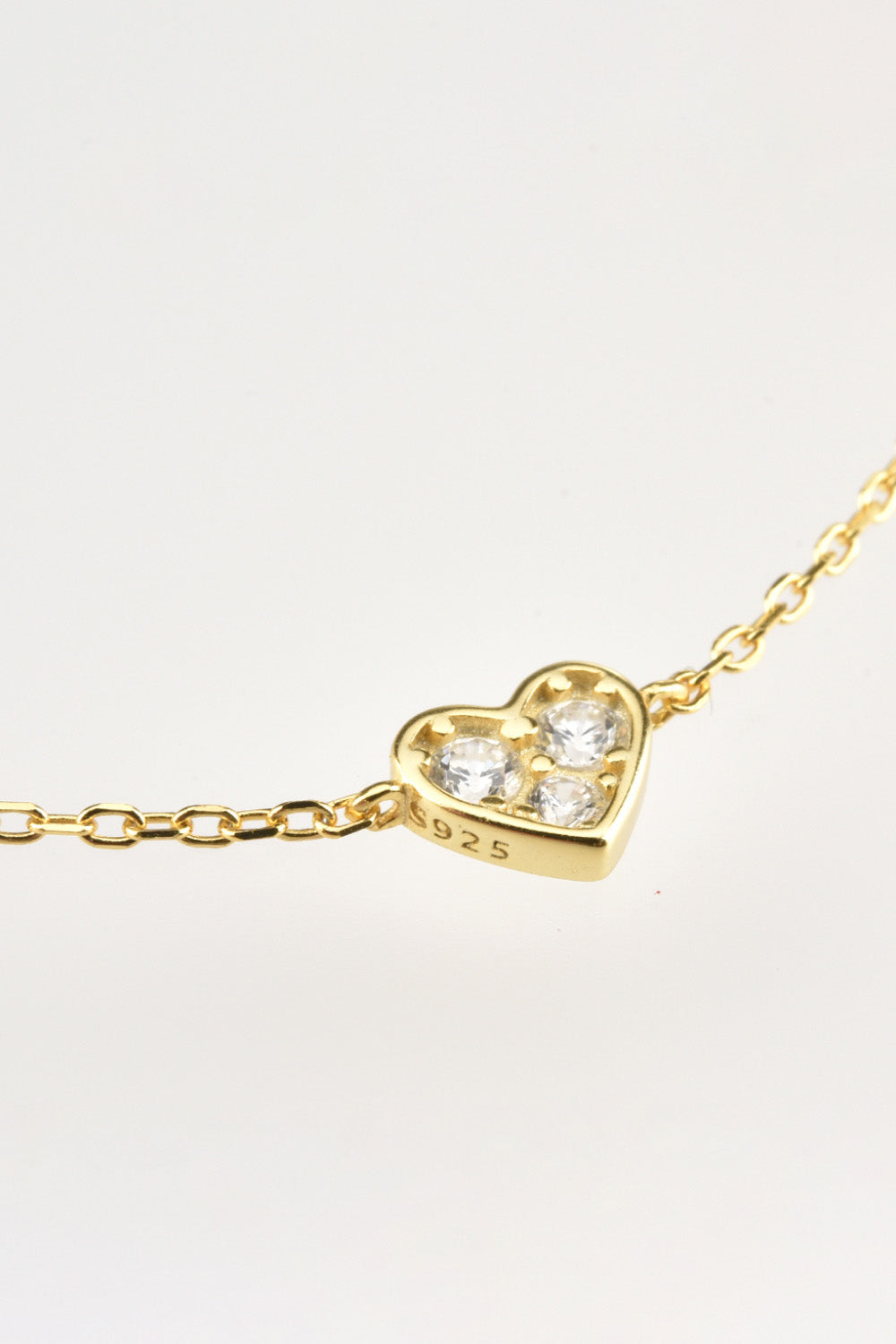 Wear our heart necklace as a symbol of love and affection, a perfect gift for someone special.