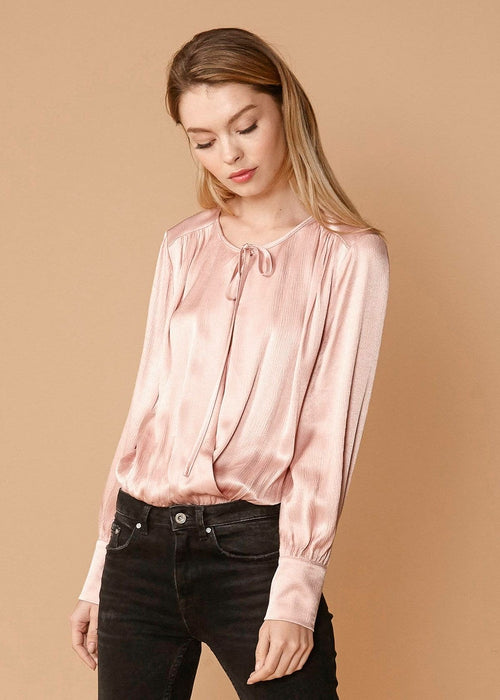 Fall Pink Tie Neck Bodysuit' describing a bodysuit in a pink color with a tie neck feature, perfect for a stylish and versatile outfit option.