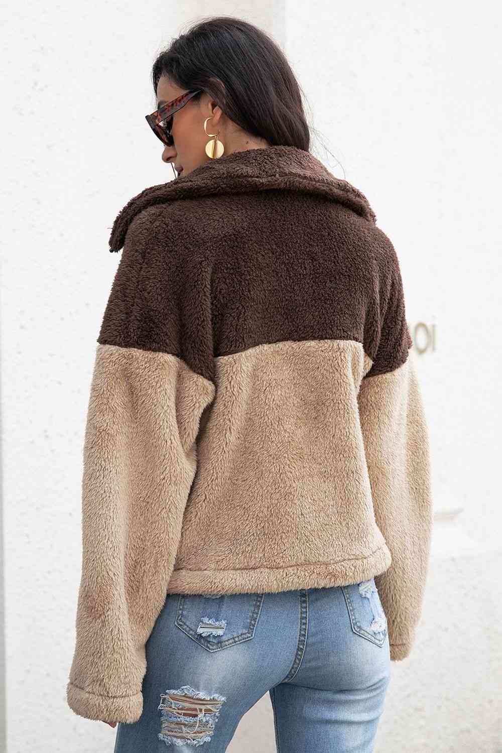 A 'Neck Fuzzy Jacket,' a cozy and warm jacket typically featuring a soft and fuzzy material around the neck or collar area, providing comfort and style for chilly weather.