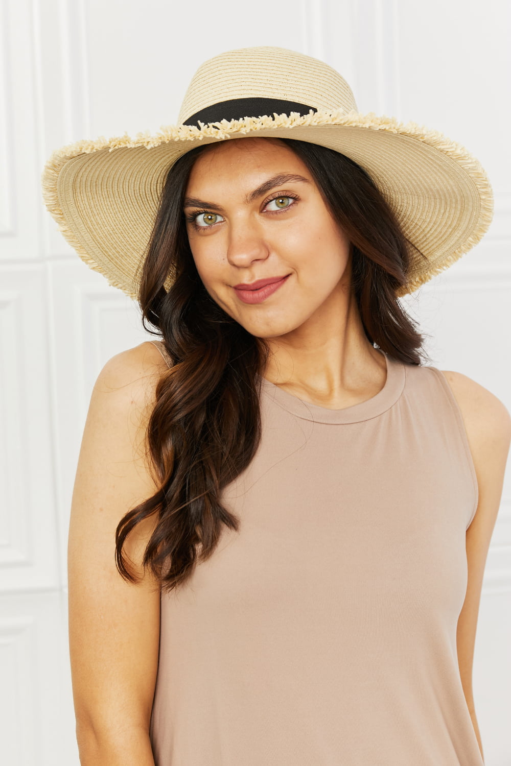 Straw Hat: A classic and versatile hat made from straw, ideal for staying cool and stylish in sunny weather.