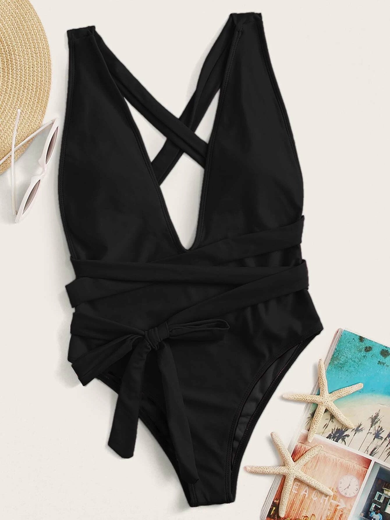 Deep V-Neck Swimsuit: A swimwear piece with a plunging V-shaped neckline, adding a touch of allure and style to your beach or poolside look.