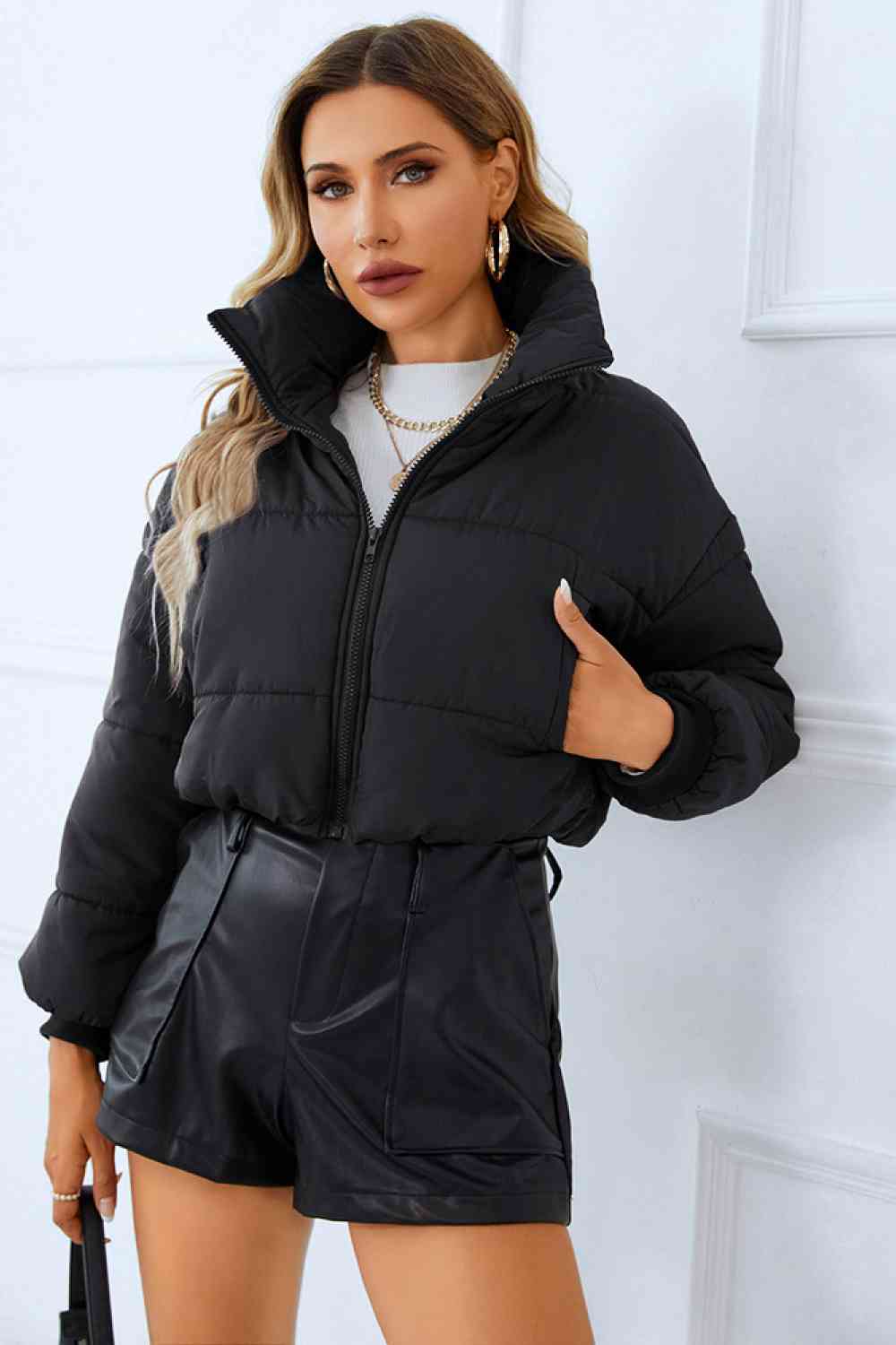 A winter coat designed for warmth and functionality, featuring multiple spacious pockets for added convenience.