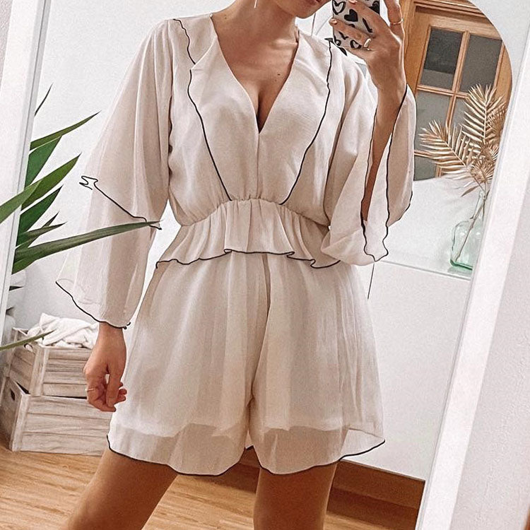 Ruffles Tiered Romper' showcasing a romper with tiered layers and charming ruffle details for a playful and stylish appearance.