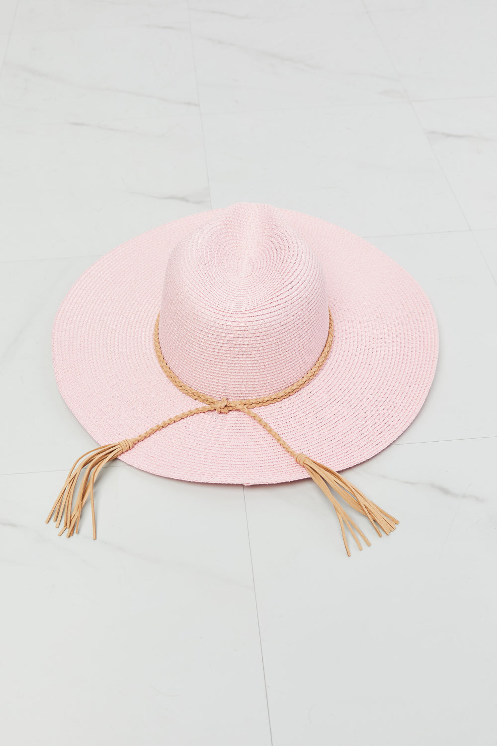 Rancher Straw Hat: A rustic and stylish hat crafted from straw, reminiscent of the classic rancher's headwear, ideal for a Western-inspired look.