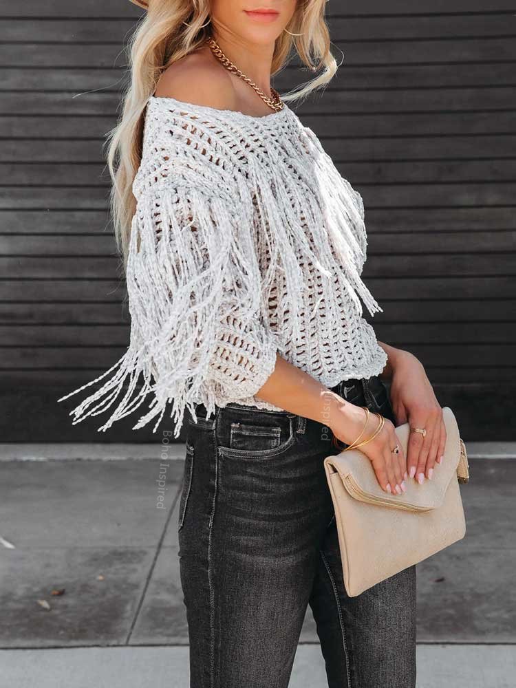 Wrap yourself in cozy elegance with our knitted blouse, a versatile addition to your wardrobe.