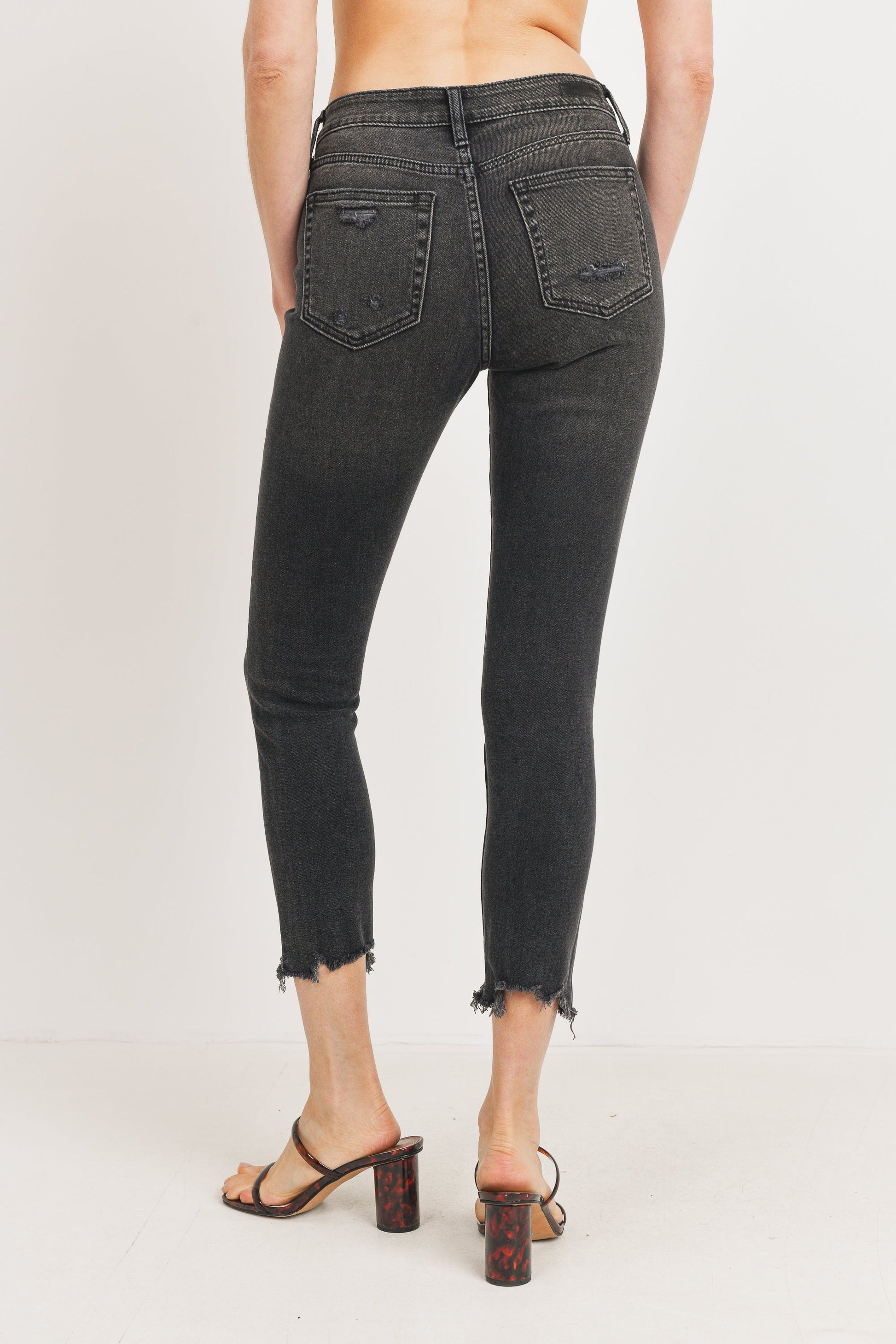 Stretch Skinny Jeans: Form-fitting denim pants with added stretch for comfort and a sleek, modern silhouette.