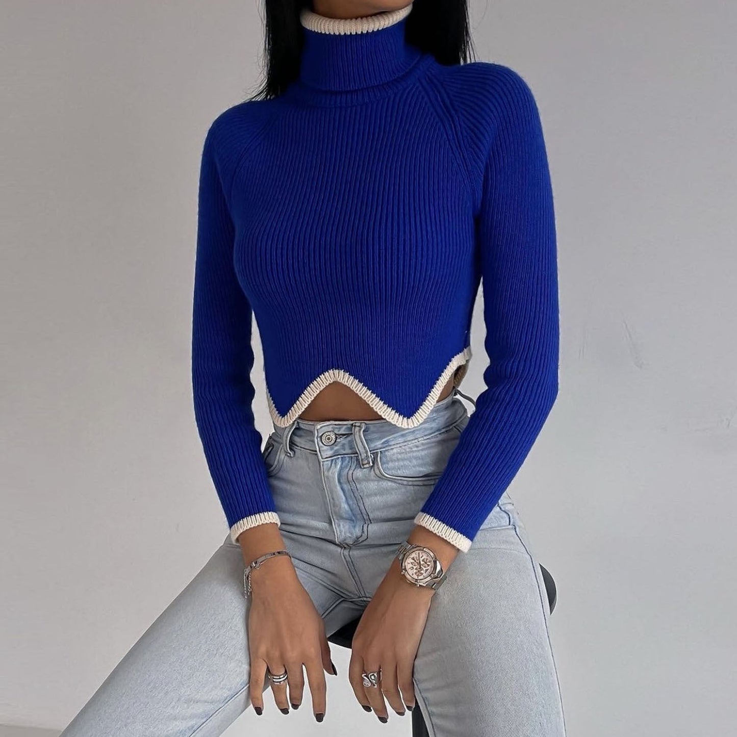 High Neck Short Sweater: A stylish sweater with a high neckline and a shorter length, offering a fashionable and comfortable look.