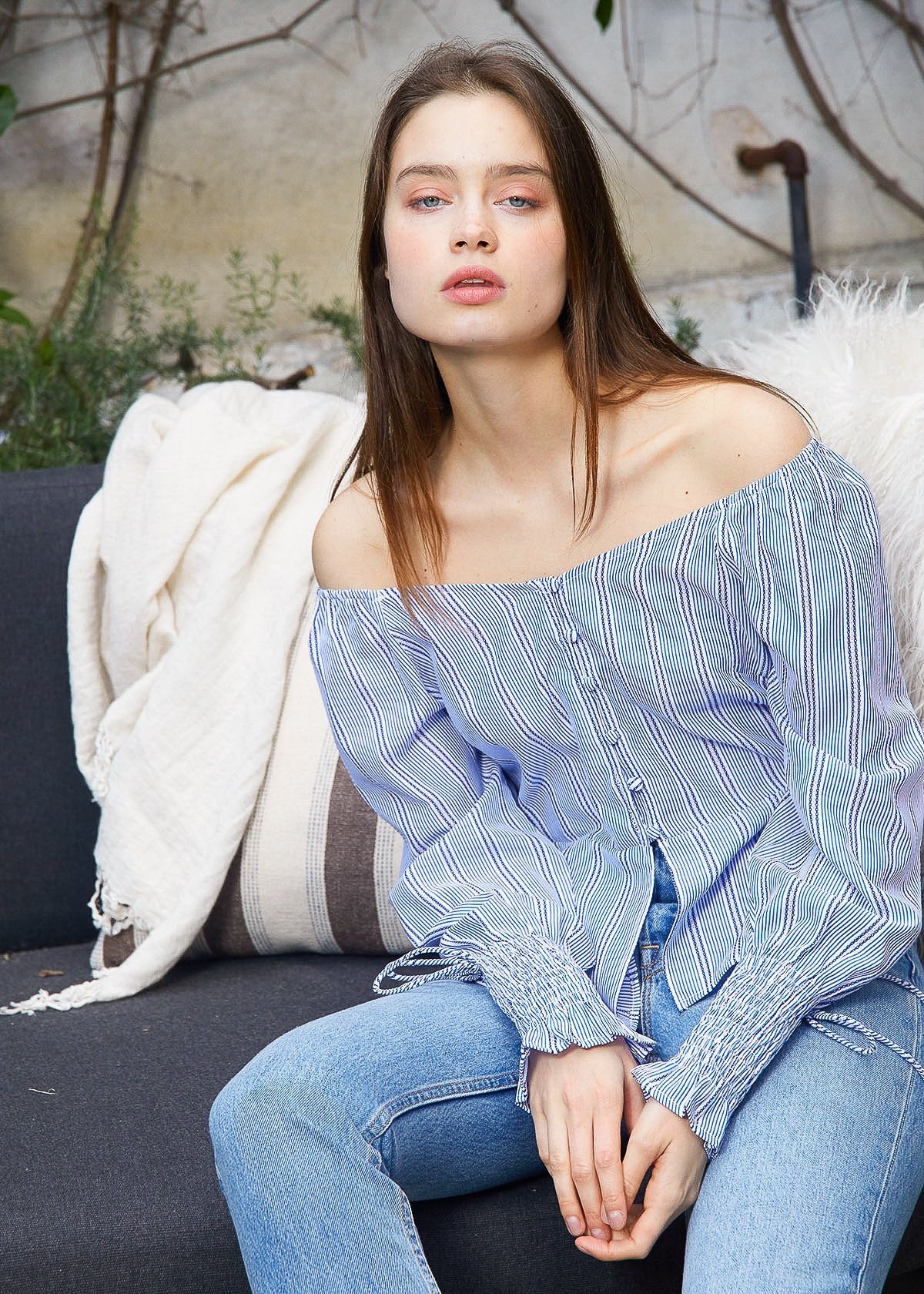 Blue Off-Shoulder Blouse' featuring a blouse in a vibrant blue color with an off-shoulder neckline, creating a chic and stylish look.