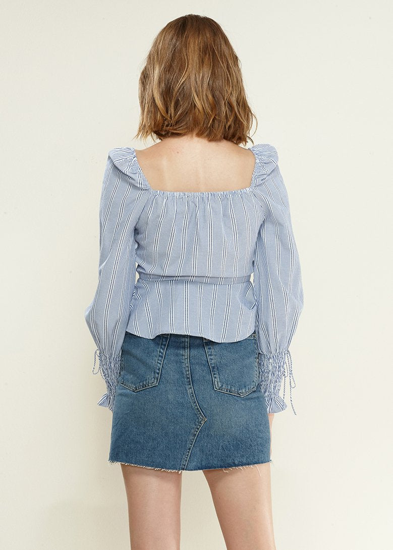 Blue Off-Shoulder Blouse' featuring a blouse in a vibrant blue color with an off-shoulder neckline, creating a chic and stylish look.