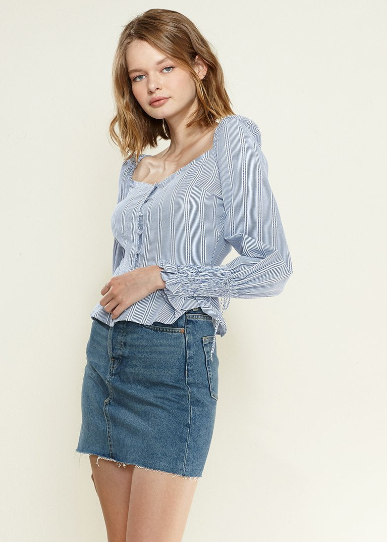 Blue Off-Shoulder Blouse' featuring a blouse in a vibrant blue color with an off-shoulder neckline, creating a chic and stylish look.