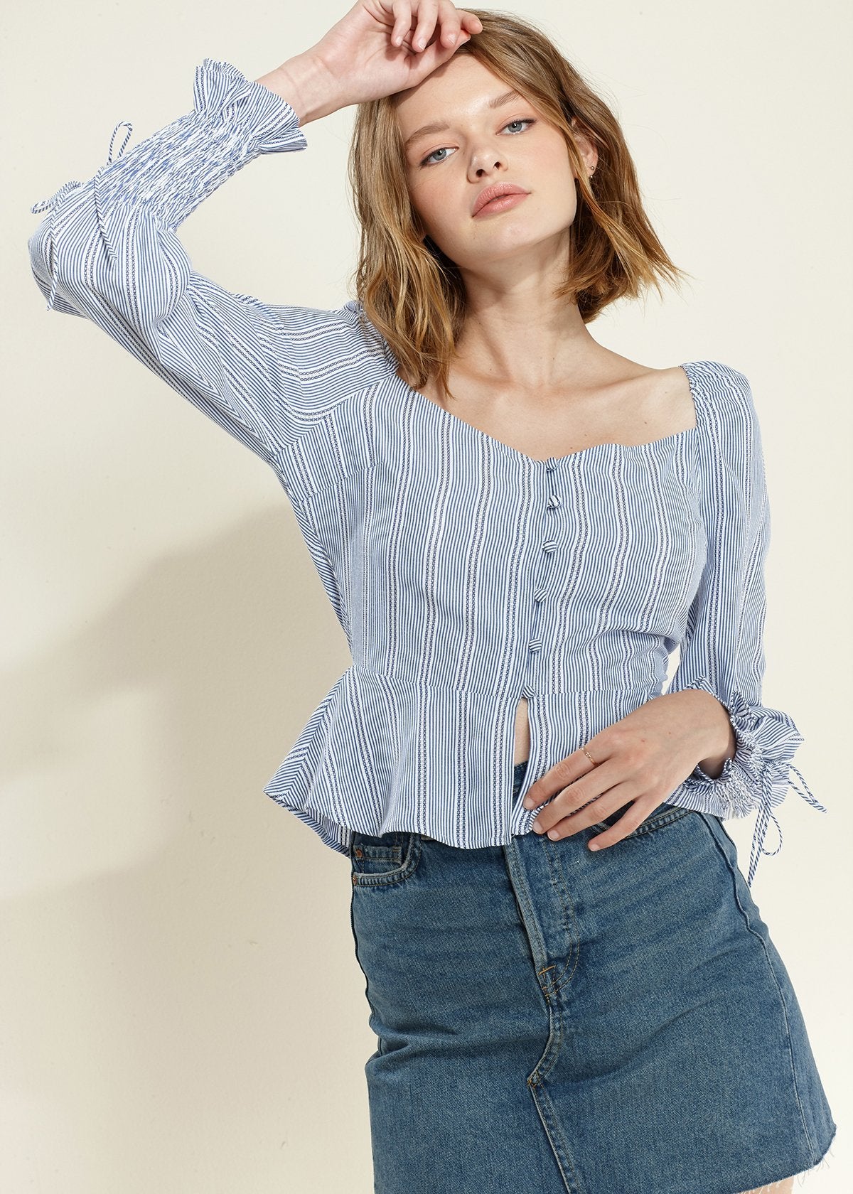Blue Off-Shoulder Blouse' featuring a blouse in a vibrant blue color with an off-shoulder neckline, creating a chic and stylish look.