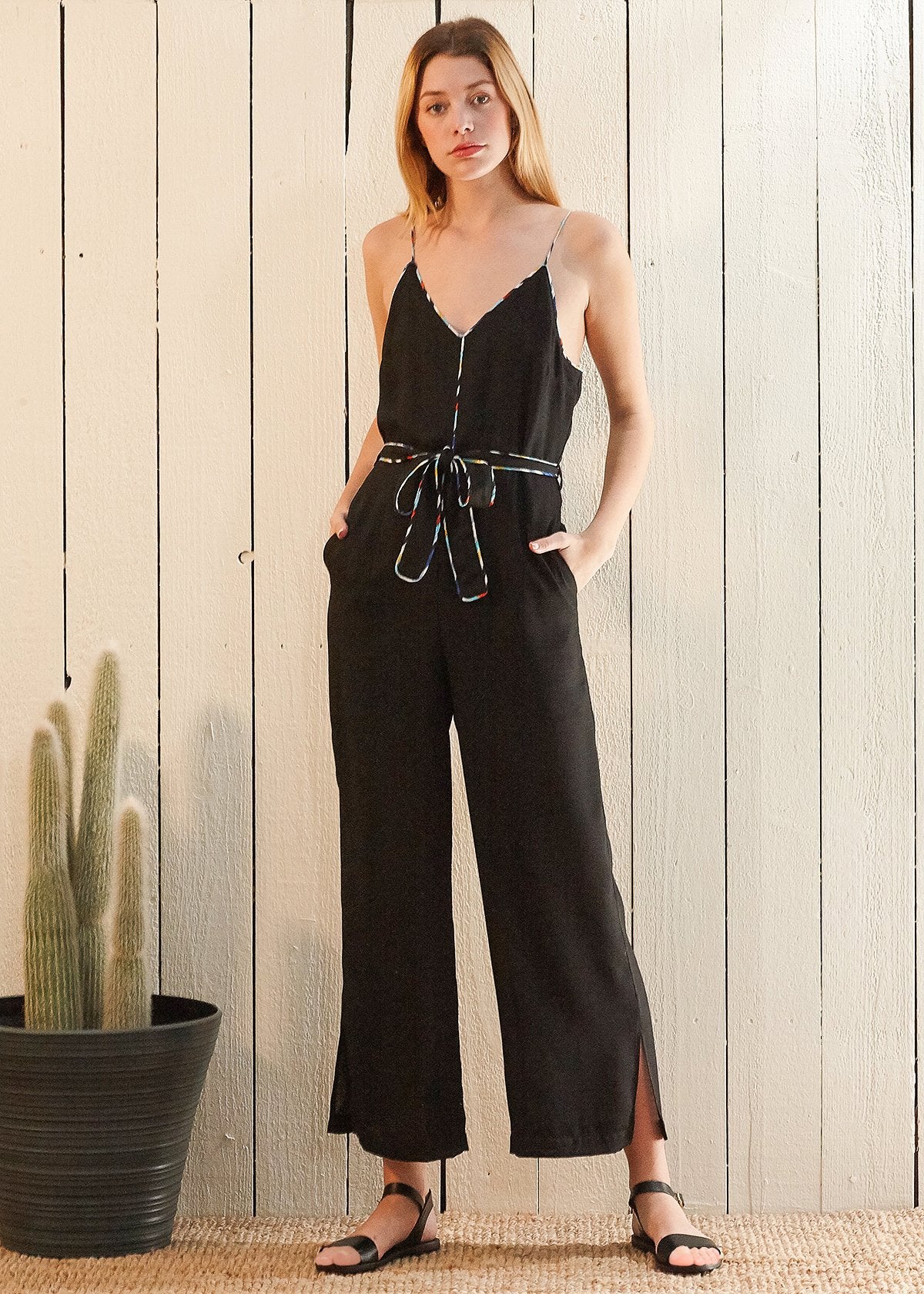 Multi-Color Binding Jumpsuit: A fashionable one-piece outfit featuring colorful binding details, adding a vibrant and stylish touch to your ensemble.
