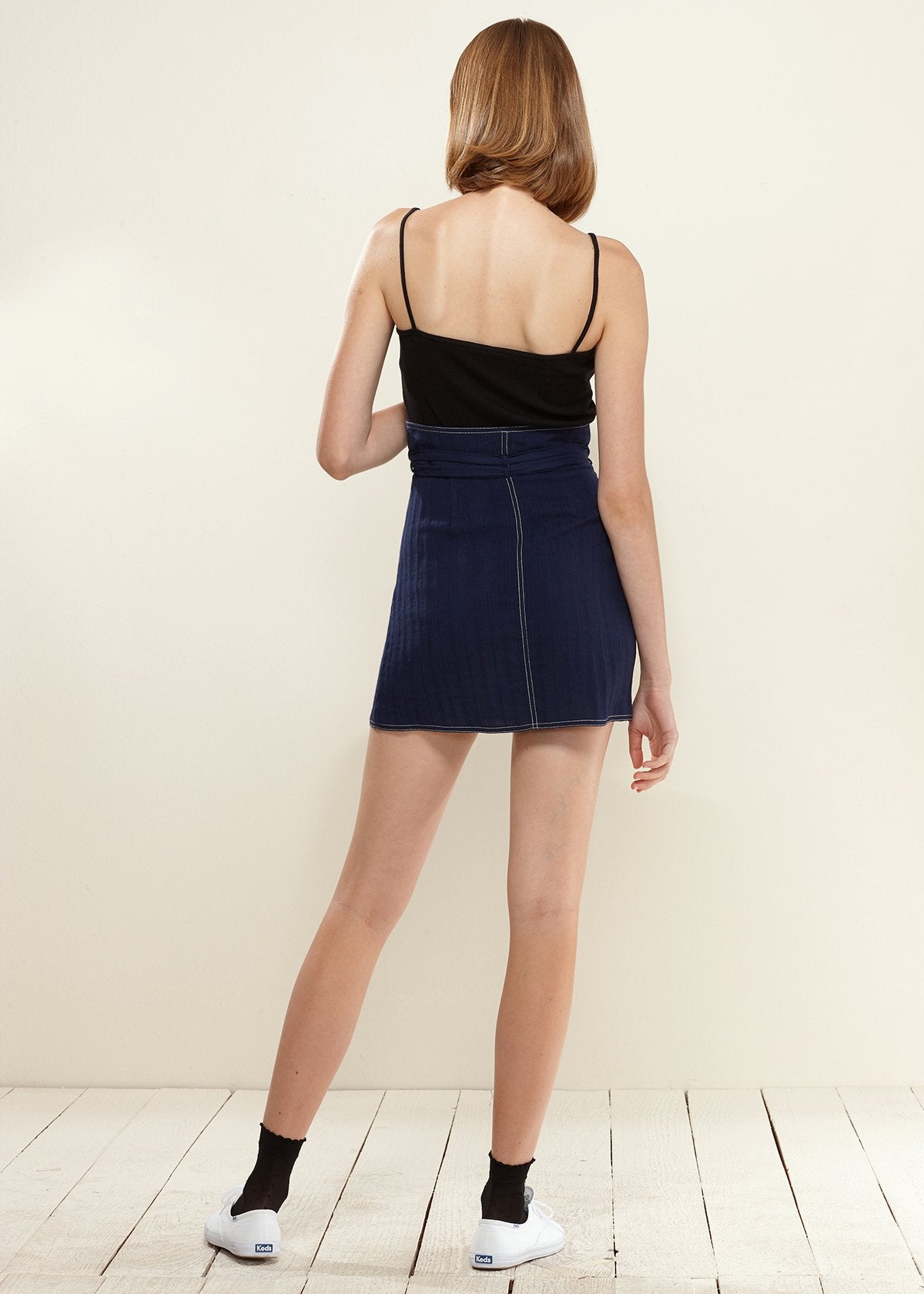 Stitch High Waist Skirt' showcasing a skirt with a high-waisted design and stitch detailing, offering a stylish and flattering addition to your outfit.
