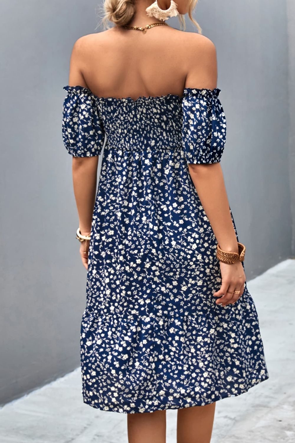 Smocked Off-Shoulder Dress: A stylish dress featuring a smocked bodice and an off-shoulder neckline for a trendy and feminine look.