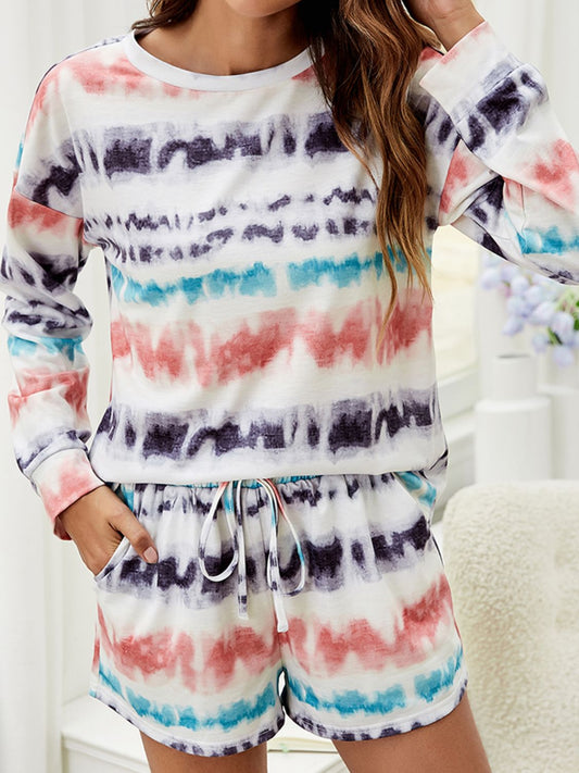 Two-Piece Lounge Set' referring to a coordinated loungewear ensemble consisting of two separate pieces, typically a top and bottom, designed for comfort and relaxation.