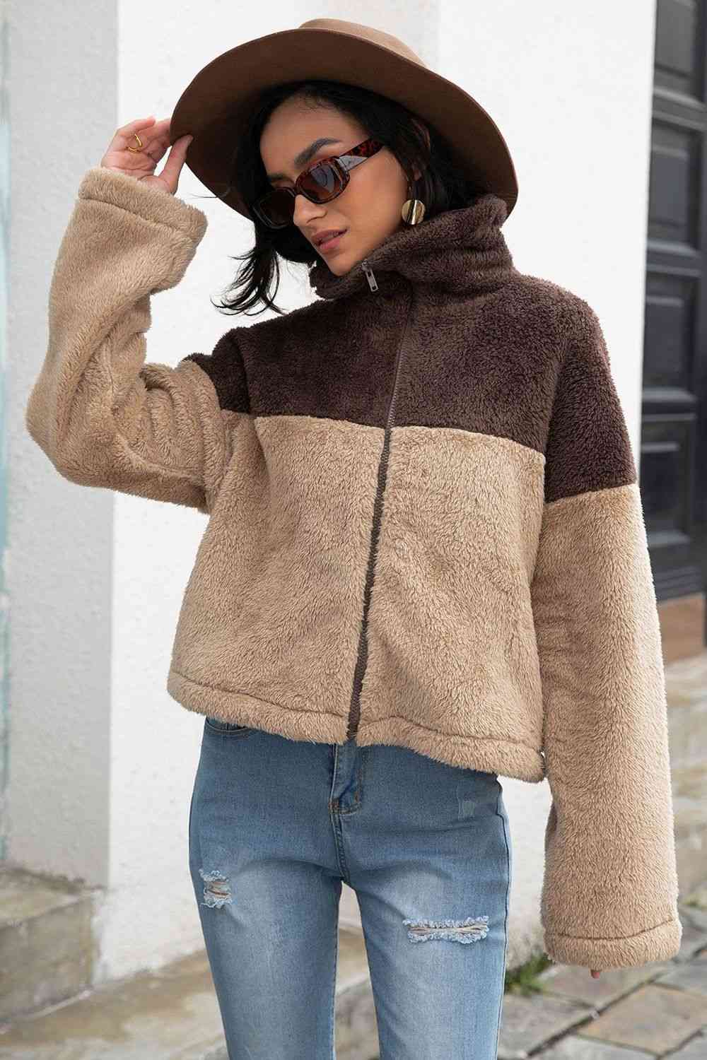 A 'Neck Fuzzy Jacket,' a cozy and warm jacket typically featuring a soft and fuzzy material around the neck or collar area, providing comfort and style for chilly weather.