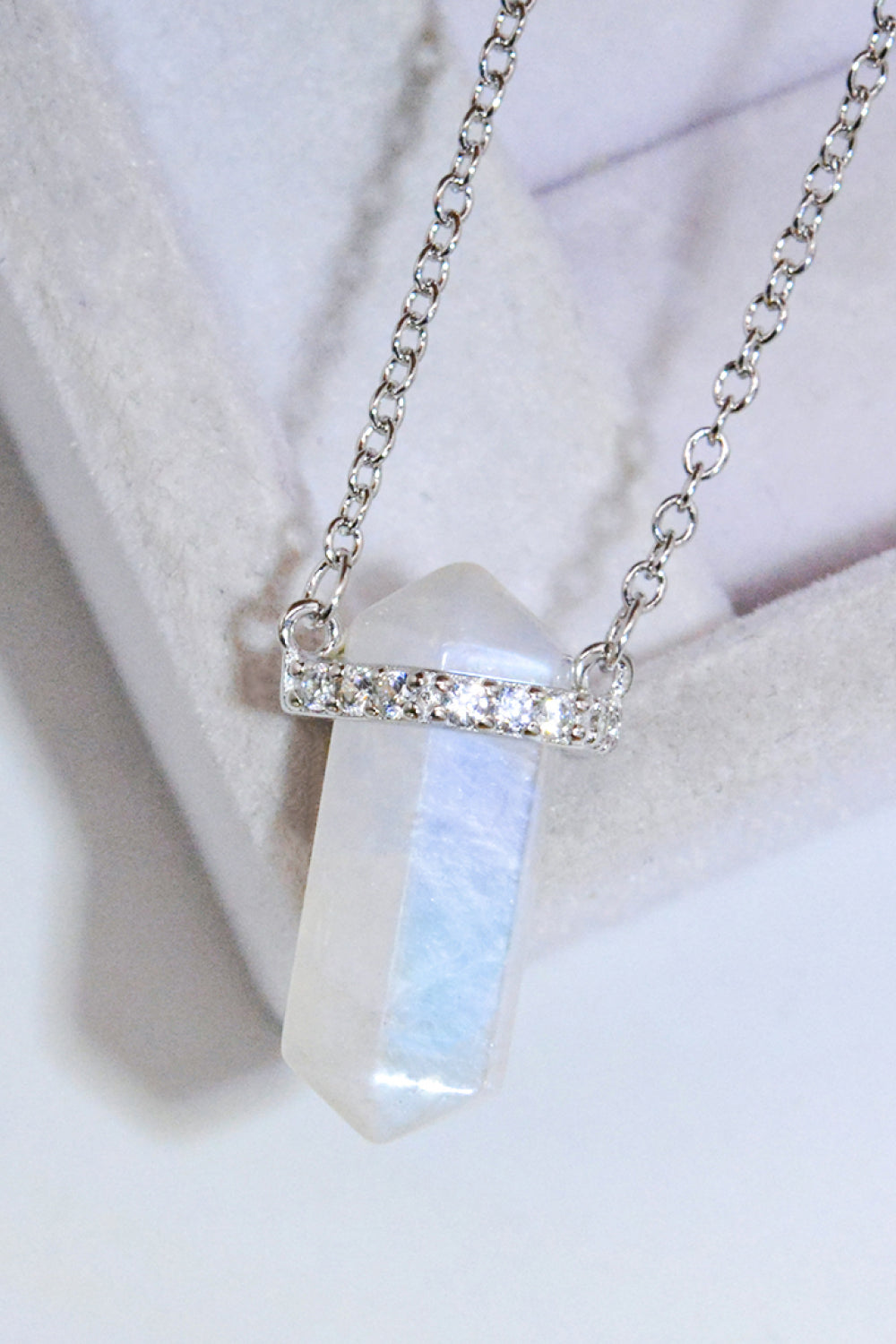 Moonstone Necklace: A necklace featuring a moonstone, known for its ethereal and iridescent quality, creating a mystical and elegant piece of jewelry.