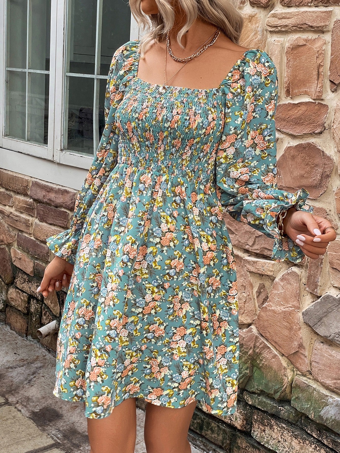 Square Neck Floral Dress: A charming dress with a square-shaped neckline adorned with floral patterns, offering a delightful and stylish look.