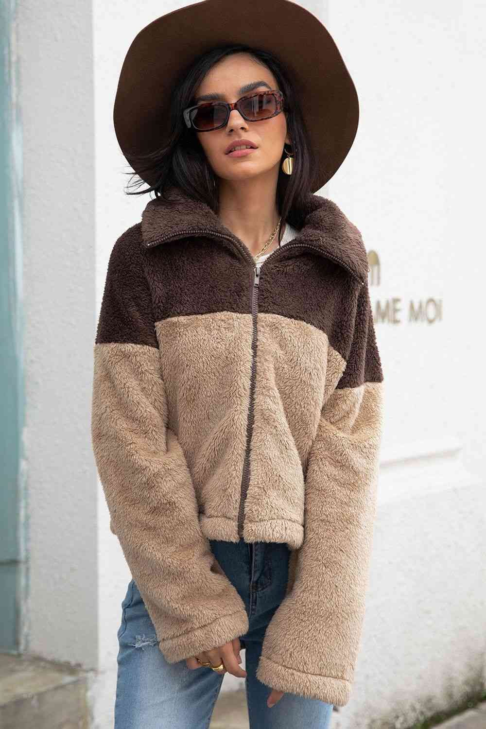 A 'Neck Fuzzy Jacket,' a cozy and warm jacket typically featuring a soft and fuzzy material around the neck or collar area, providing comfort and style for chilly weather.