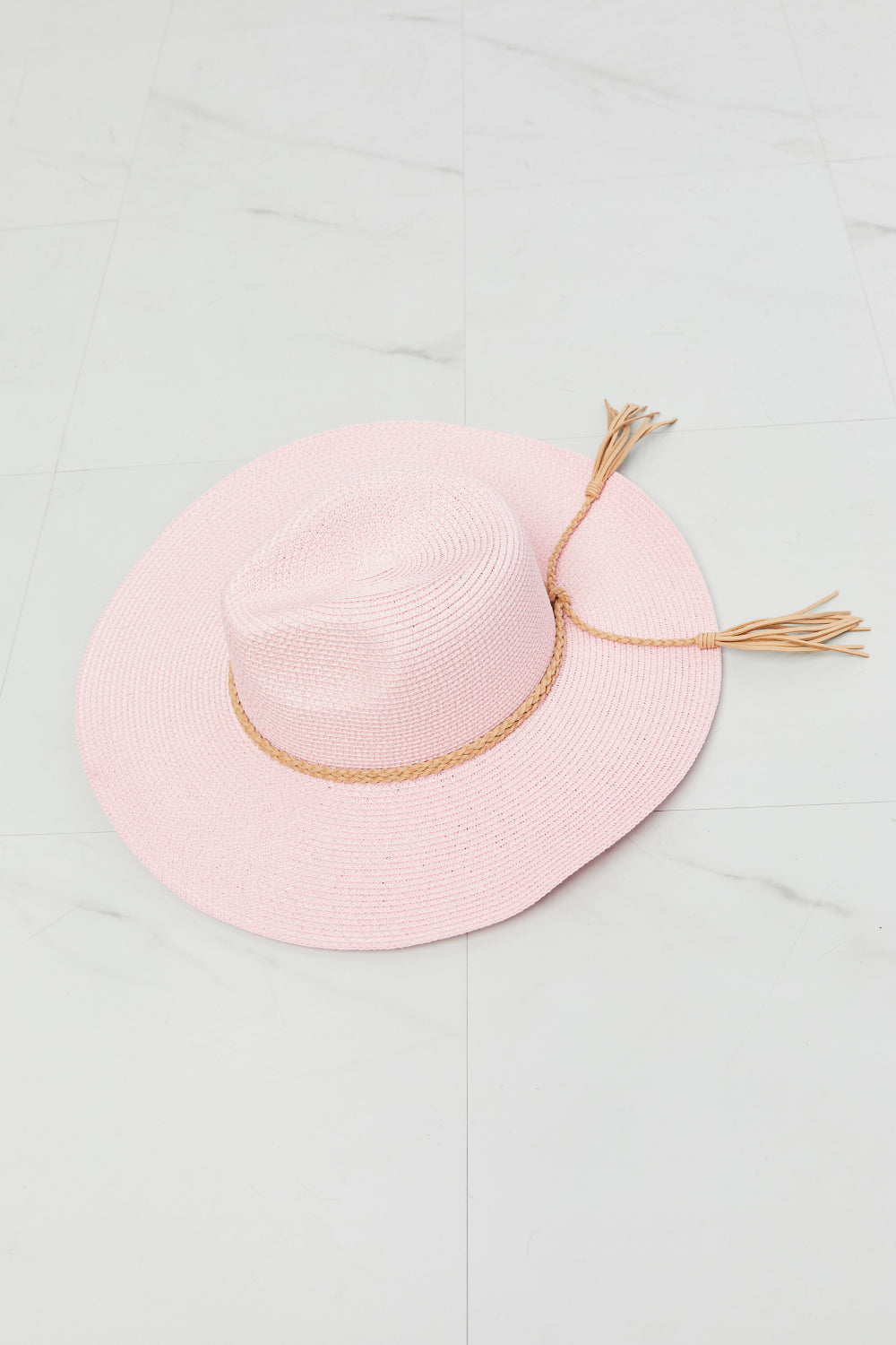 Rancher Straw Hat: A rustic and stylish hat crafted from straw, reminiscent of the classic rancher's headwear, ideal for a Western-inspired look.