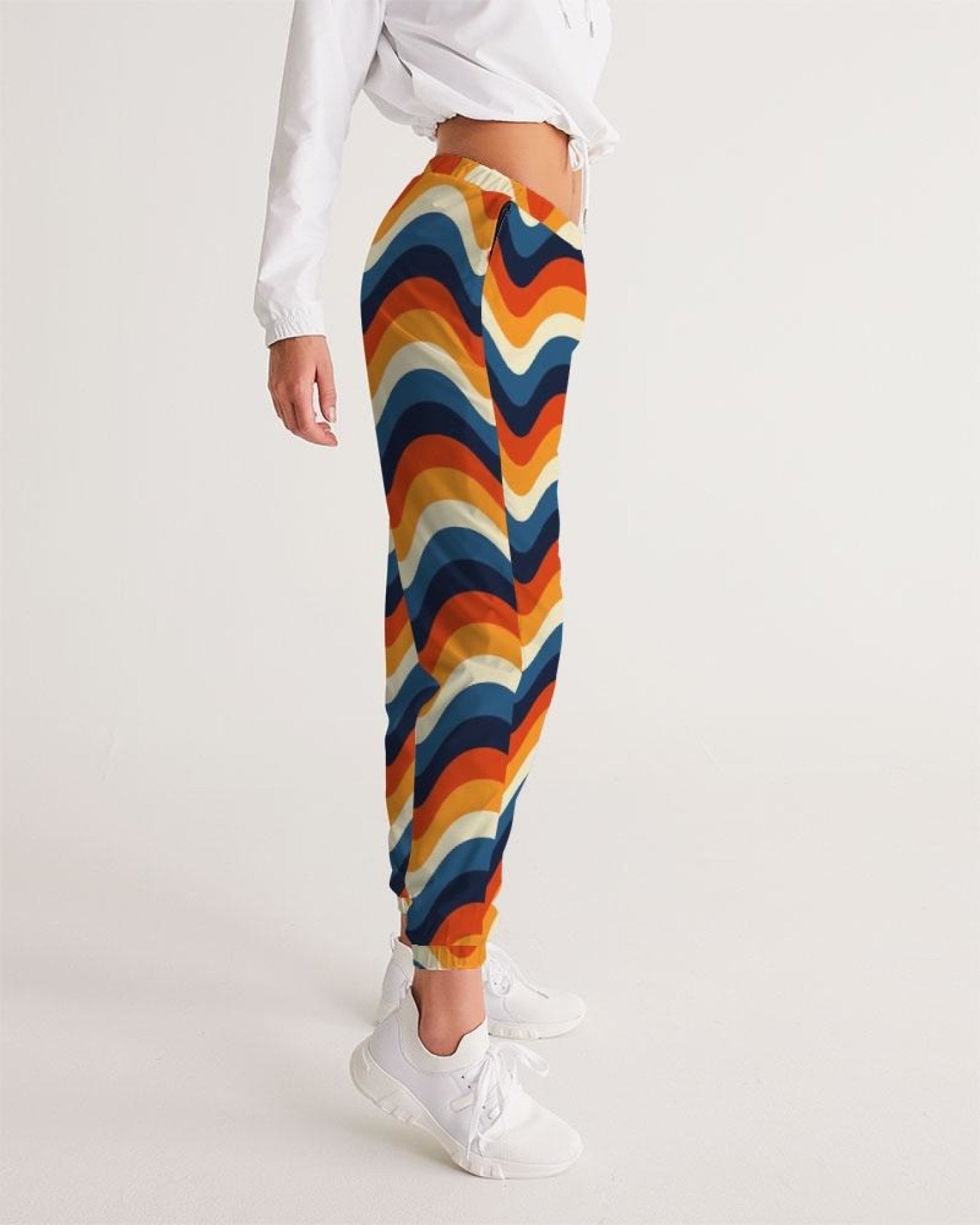 Elevate your style with comfy geometric track pants. Stand out in unique designs while staying active. Shop now for a fashionable workout!