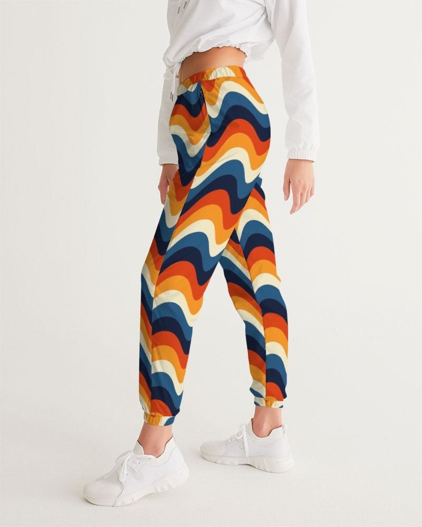 Elevate your style with comfy geometric track pants. Stand out in unique designs while staying active. Shop now for a fashionable workout!